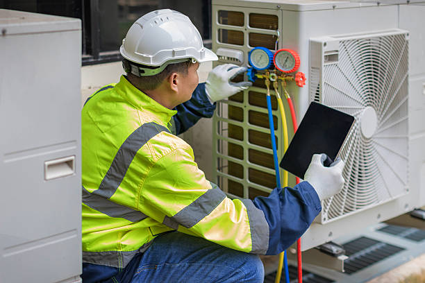 Professional Air Duct Cleaning technician working in Riverhead, NY